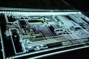Abstract glowing circuit board technology background