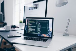 Developer writing code on a computer